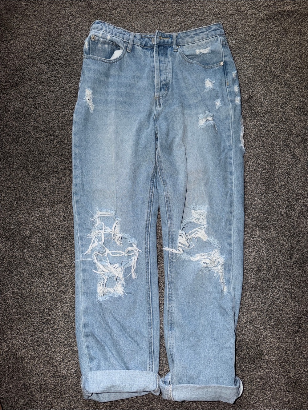 Woman’s Light Blue Distressed Jeans